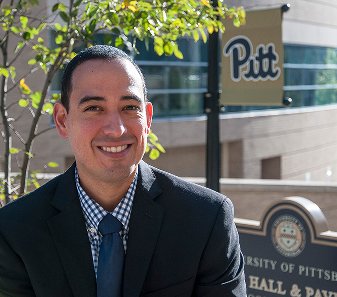 Christian Fernandez in front of Salk Hall