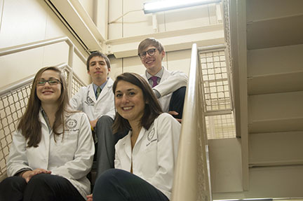 Nick Farina, Kevin Ordons, Rachel Filiaggi, Marissa Csovelak and Melissa Shook sitting on stairs