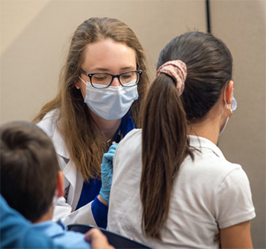 Student with Patient